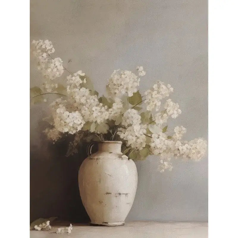 A weathered off-white ceramic vase with subtle crackle glaze holding delicate white blossoms in decorbites vintage floral vase canvas wall art