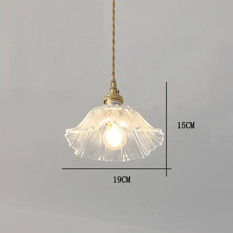 Clear fluted flower glass pendant light with brass fixture and twisted rope cord for vintage home decor by DecorBites™