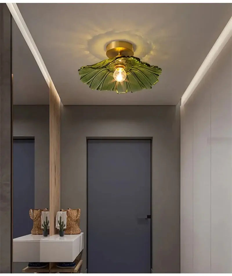 Green leaf-shaped flower glass pendant lights with brass fixture for vintage home decor by DecorBites