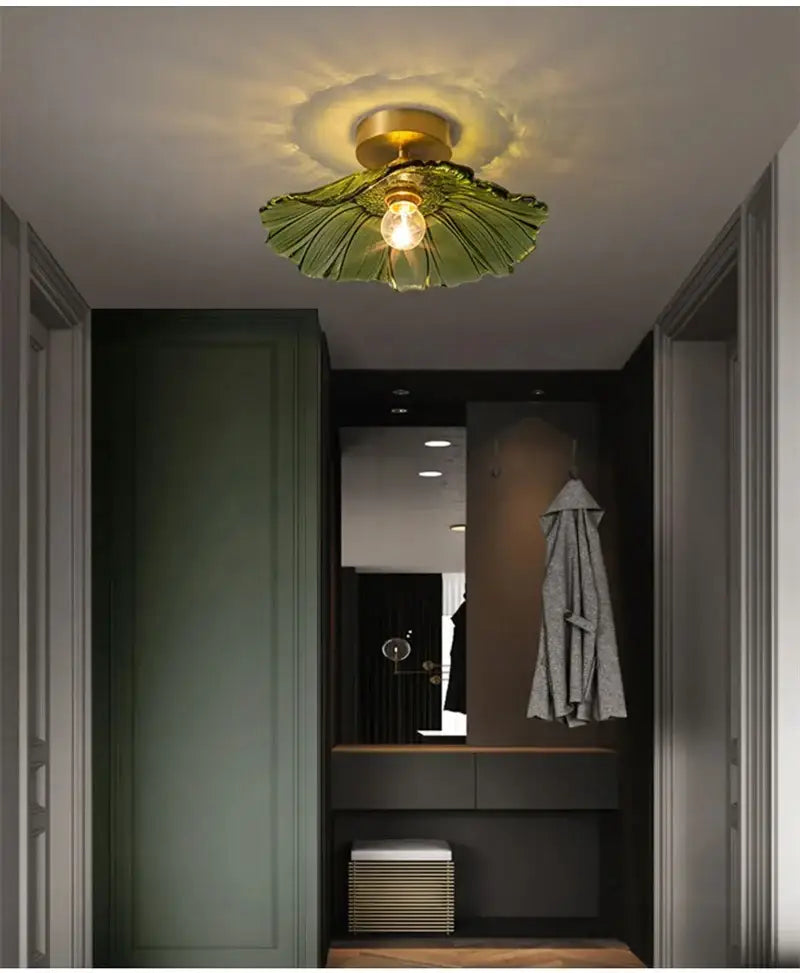 Green leaf-shaped flower glass pendant light with brass fixture for vintage home decor by DecorBites