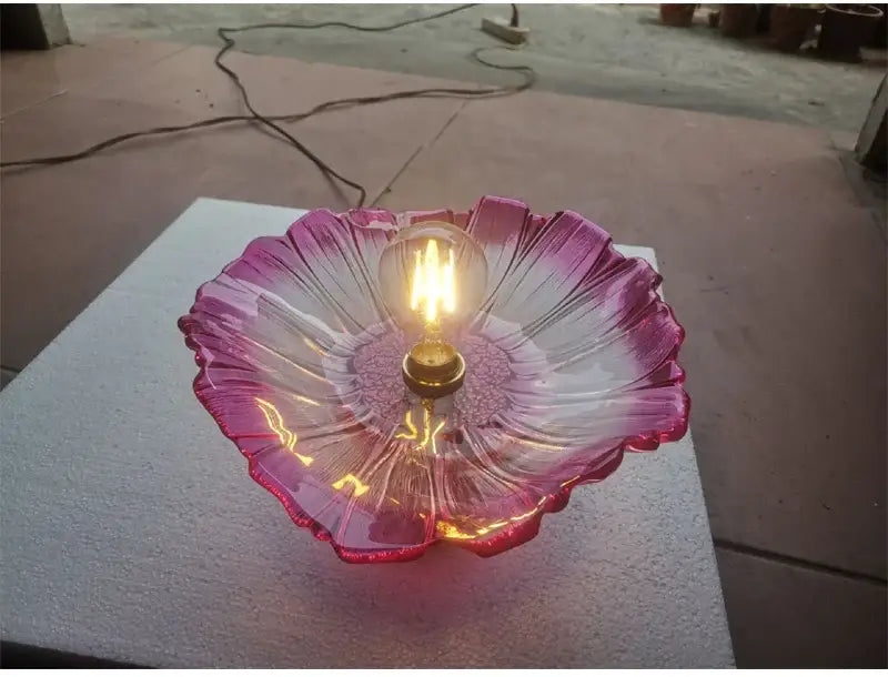 DecorBites™ vintage flower glass pendant lights featuring a glowing pink and clear glass flower with Edison bulb for home decor