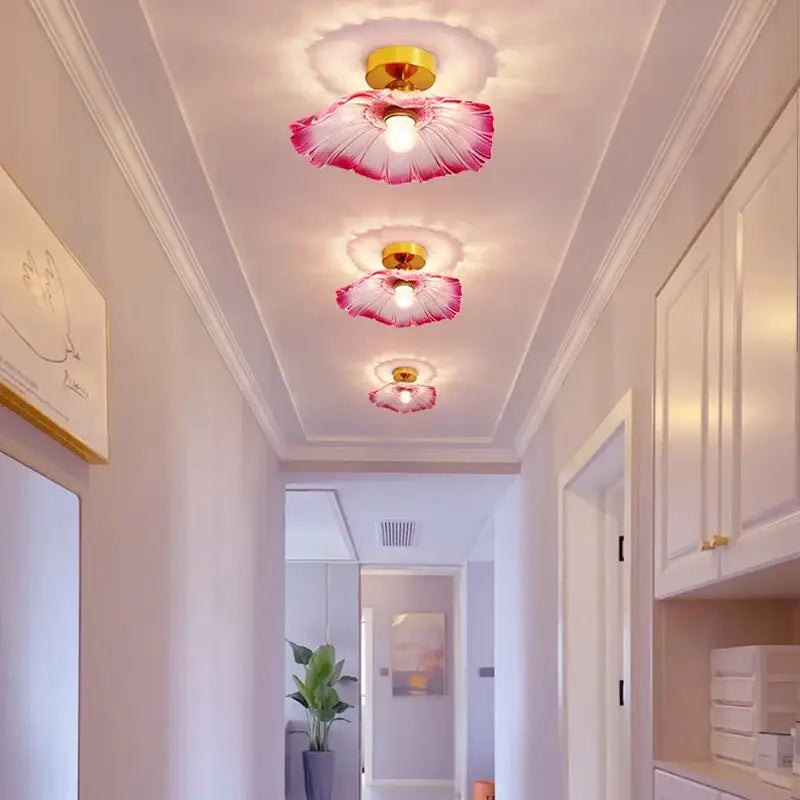 Pink glass flower pendant light with gold-finished center for vintage home decor by DecorBites™