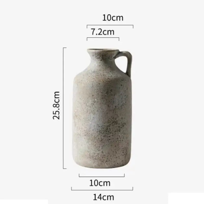 A rustic gray ceramic vase with speckled texture and sturdy handle vintage handmade decor for home decor