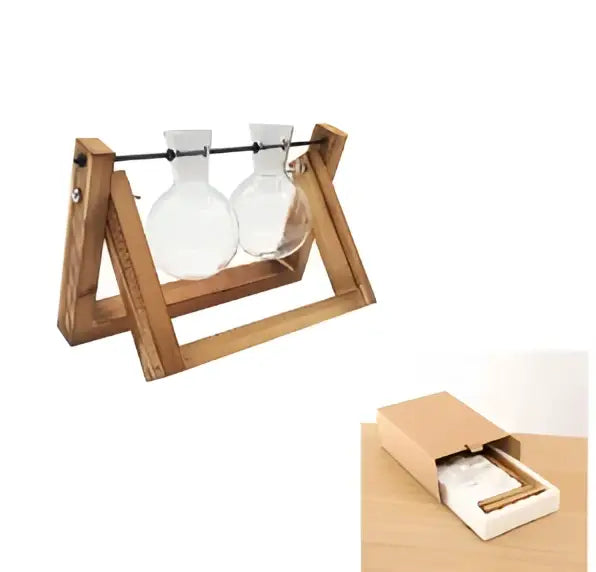 Wooden frame glass vase with two clear glass bottles on a vintage heart-shaped wooden stand by DecorBites