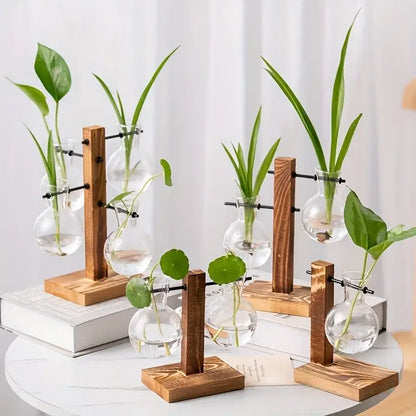 DecorBites™ vintage wooden stand holding clear two bulb vases with green plants for low style desktop propagation