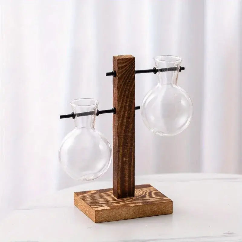DecorBites™ vintage hydroponic clear glass two bulb vases on rustic wooden stand with black metal rods for desktop use