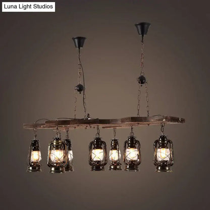 DecorBites vintage industrial 8-light linear chandelier with antique brass lantern shades hanging from rustic wood beam