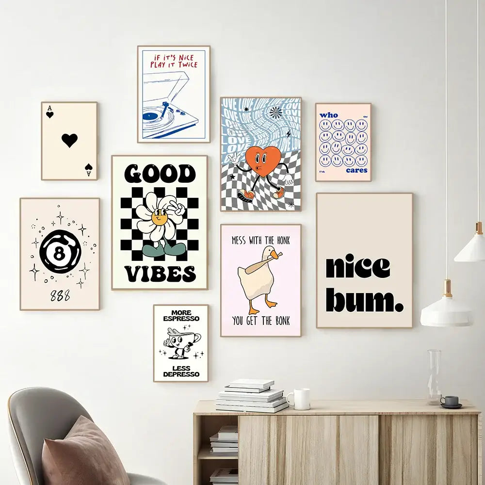 A collection of nine framed vintage pink cartoon canvas wall art posters featuring playful minimalist designs and characters