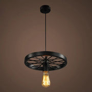 Black metal pendant light with bicycle wheel design and exposed filament bulb featuring vintage style chain cord length