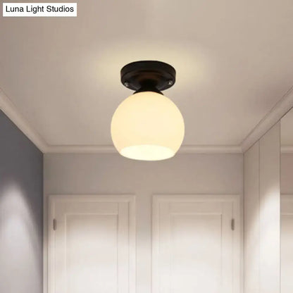 Decorbites vintage style semi flush ceiling light with warm glowing opal glass shade and black metal finish