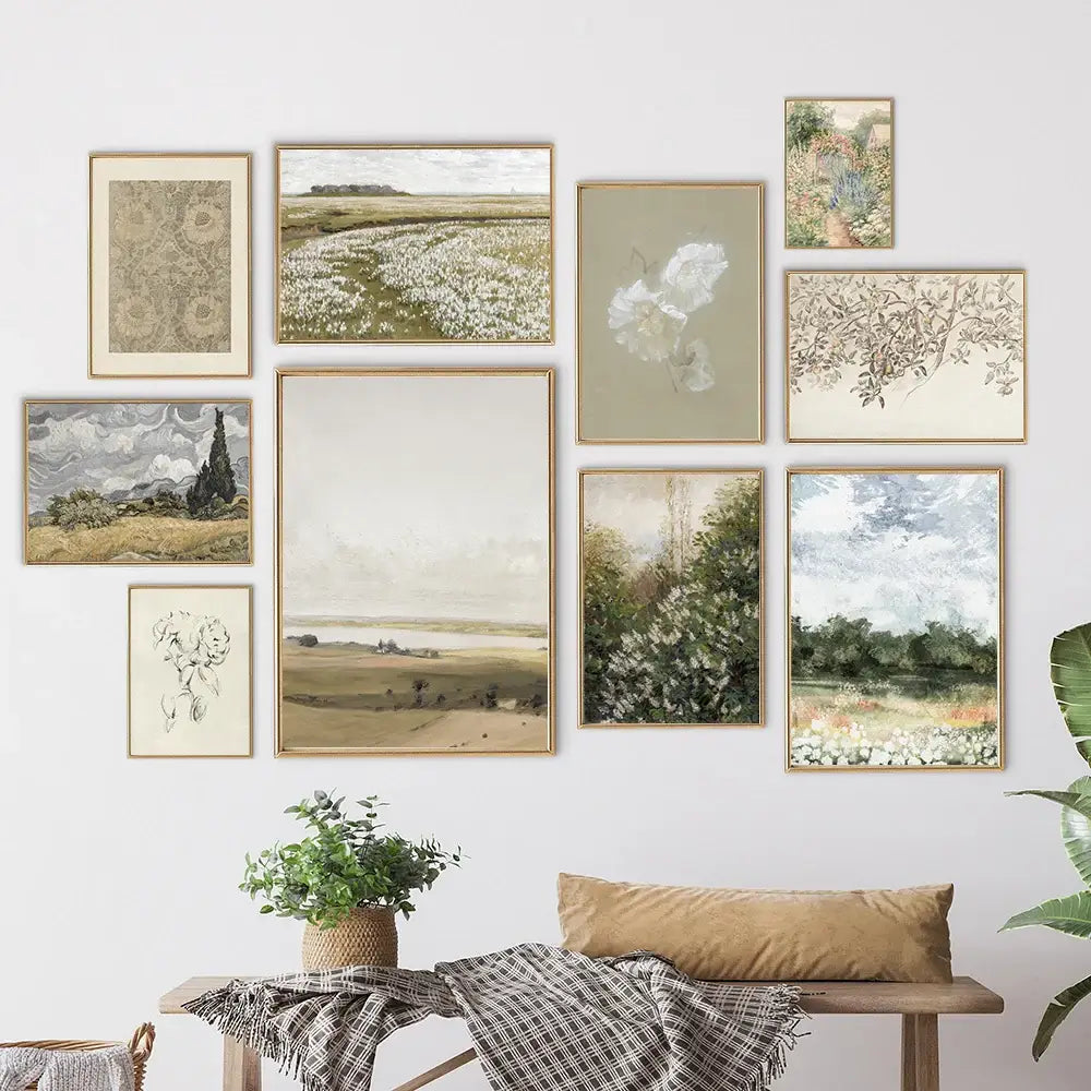 A collection of DecorBites™ vintage summer landscape oil painting prints in gold frames for a muted earth tone gallery wall
