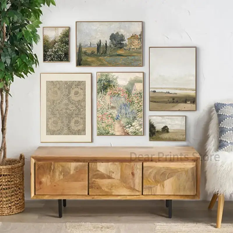 A rustic wooden console table with natural finish and geometric inlay patterns displayed below an oil painting summer landscape print for gallery wall decor