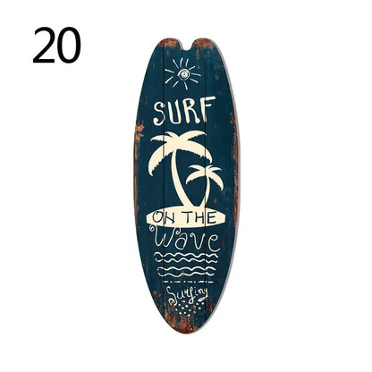 Dark teal wooden vintage surfboard door sign with white palm trees sun and surf on the wave text for beach home decor