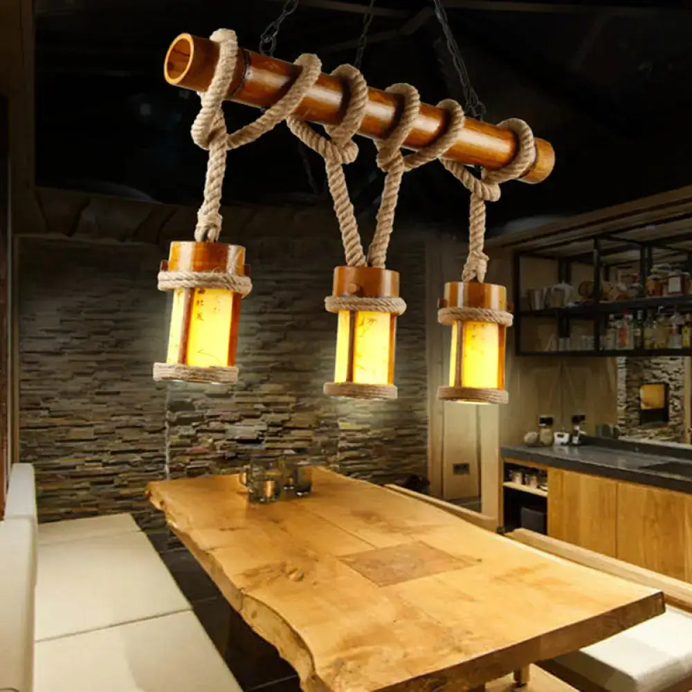 Rustic wooden pendant light with three warm yellow glass shades and rope cord for 110v-120v and 220v-240v use