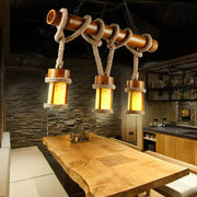 Rustic wooden pendant light with three warm yellow glass shades and rope cord for 110v-120v and 220v-240v use