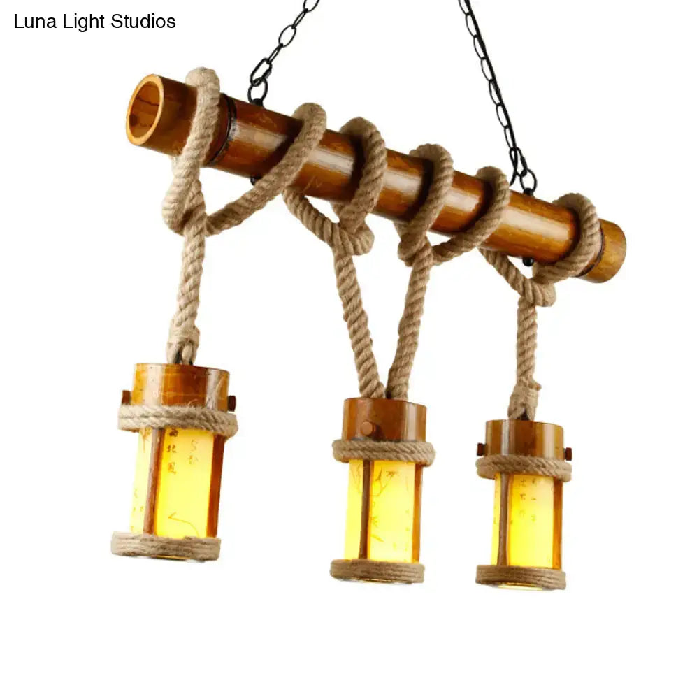 Rustic bamboo pendant lamp with three amber glass lanterns and natural rope cord compatible with 220v-240v and 110v-120v