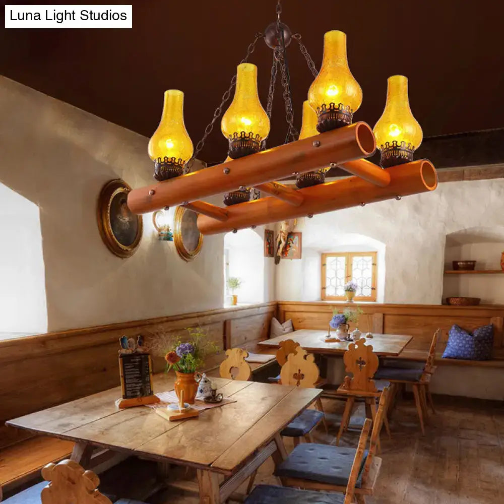 DecorBites vintage yellow crackle glass pendant light with warm amber lanterns and bamboo ladder design frame