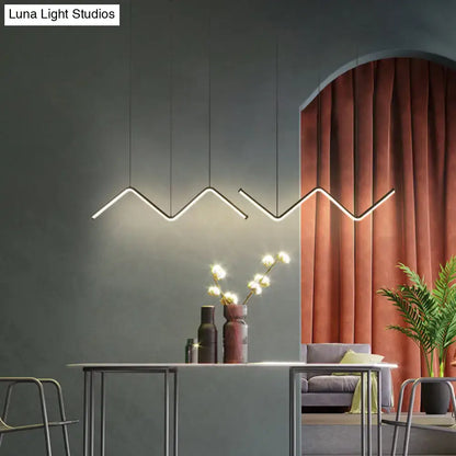 DecorBites™ W-Shaped LED pendant light fixture with sleek metal zigzag design and warm white illumination for dining room
