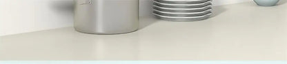 Stack of silver metal plates in decorbites™ wall mounted shelves designed for sleek wall mounted storage solutions