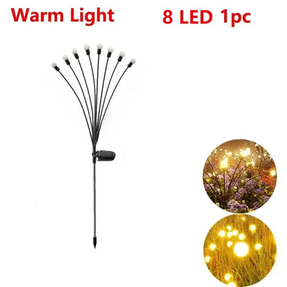 Decorbites™ warm white solar led firework lights with eight warm white led firework lights on a black garden stake