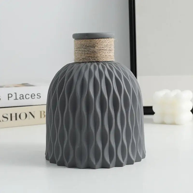 Gray ripple plastic vase with water ripple textured surface and natural twine-wrapped neck by DecorBites™ in modern Nordic style