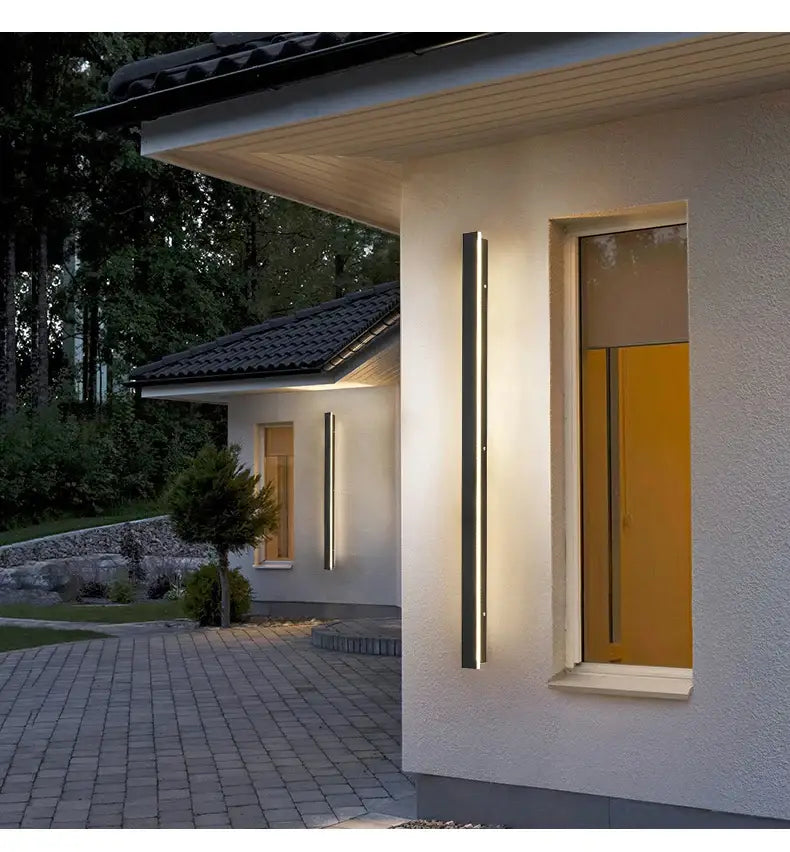 Modern black and silver vertical wall light with sleek minimalist design waterproof led for outdoor use from decorbites