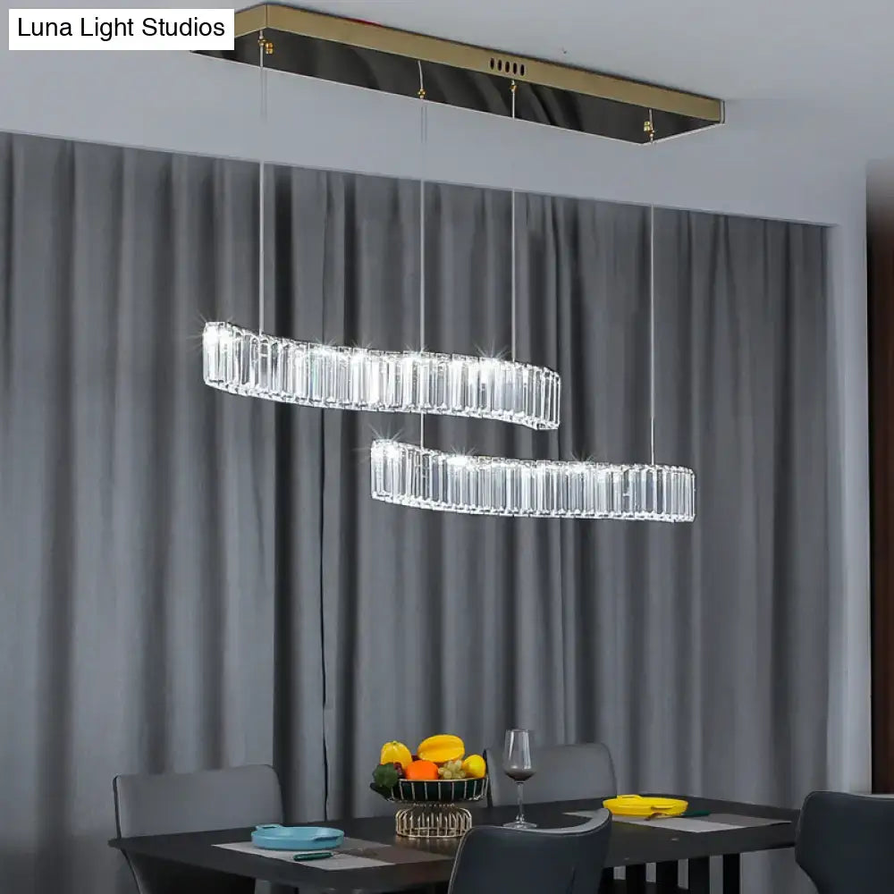 Modern rectangular DecorBites™ wavy prismatic crystal LED pendant lamp with brass finish for restaurants
