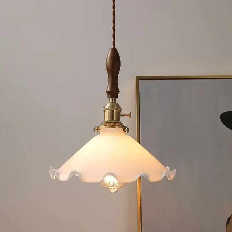 Vintage walnut and white glass led pendant light with warm frosted ruffled shade and dark wood-handled suspension cord