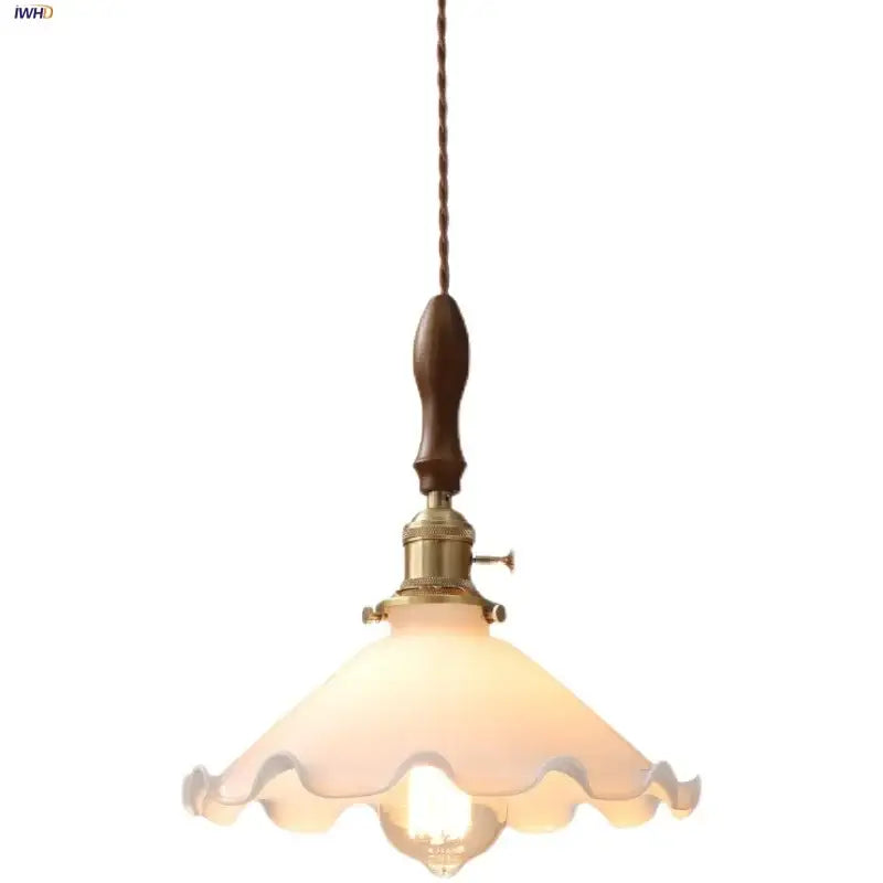 Vintage walnut and white glass led pendant light with warm frosted scalloped shade and dark wood handle suspended by twisted cord