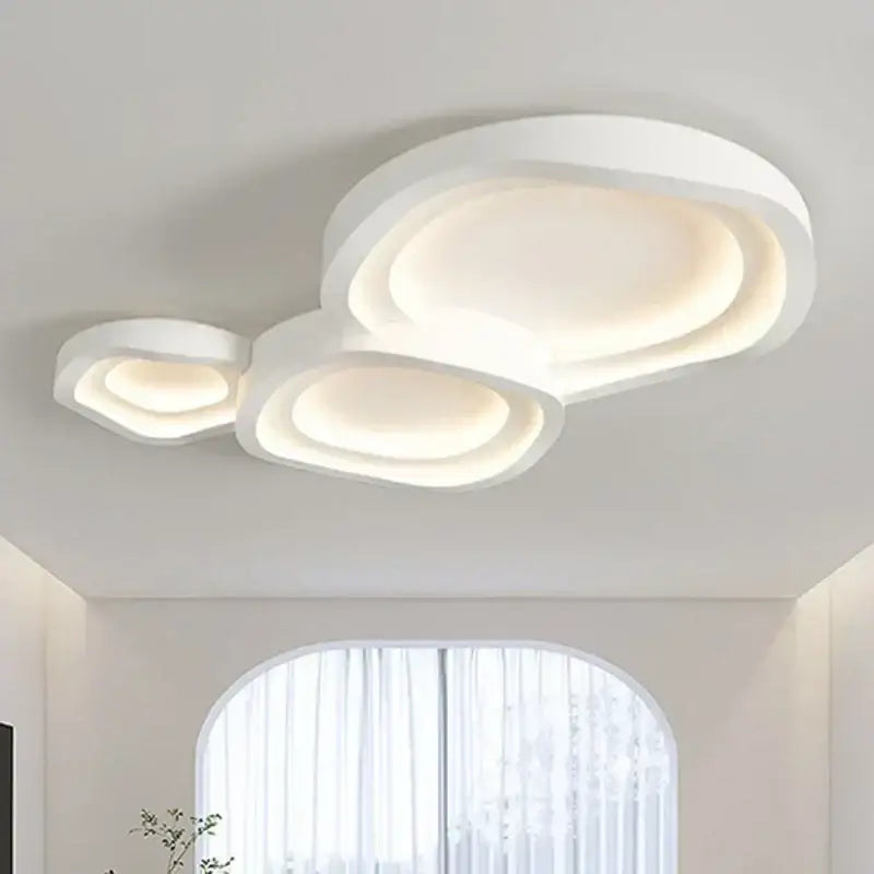Decorbites white led ceiling lamps featuring a modern white ceiling light fixture with three interconnected oval illuminated panels