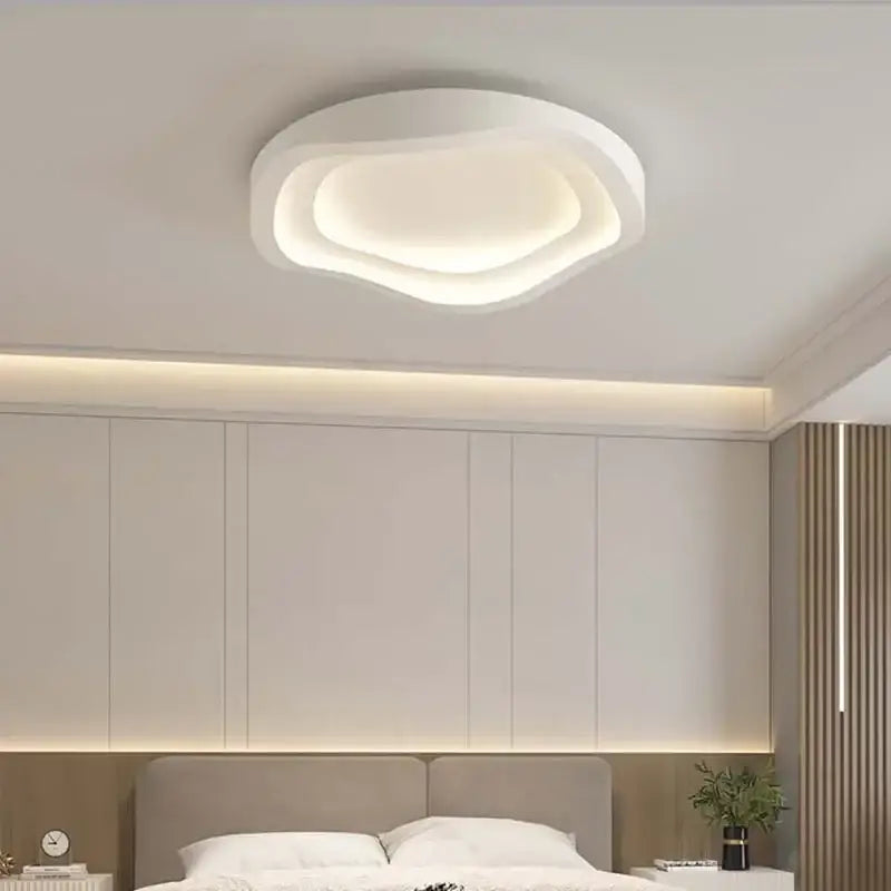 Modern white led ceiling lamp by DecorBites featuring cloud-shaped design with soft glowing illumination