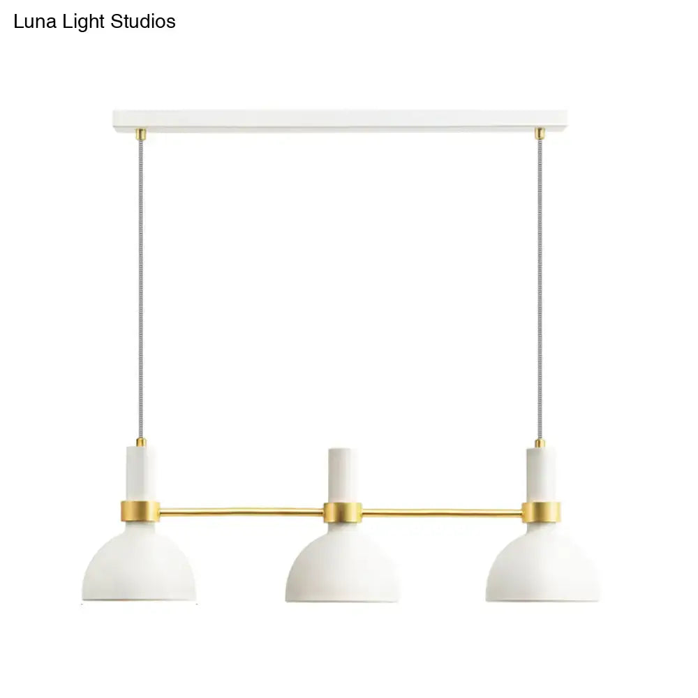 DecorBites white metal island pendant light with modern three dome-shaped downlights and gold-toned accents