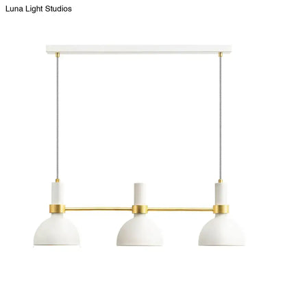 DecorBites white metal island pendant light with modern three dome-shaped downlights and gold-toned accents