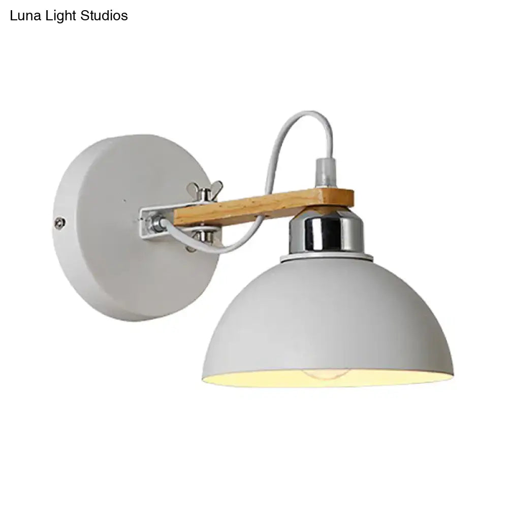 Gray dome-shaped wall light with wooden arm and chrome accents metal frame direct wired electric for bedroom use