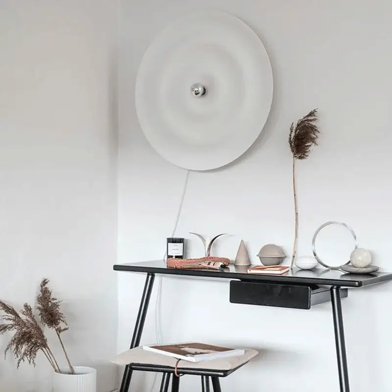 Minimalist decorbites™ white nordic bauhaus round lamp with a white circular wall sconce and metallic center