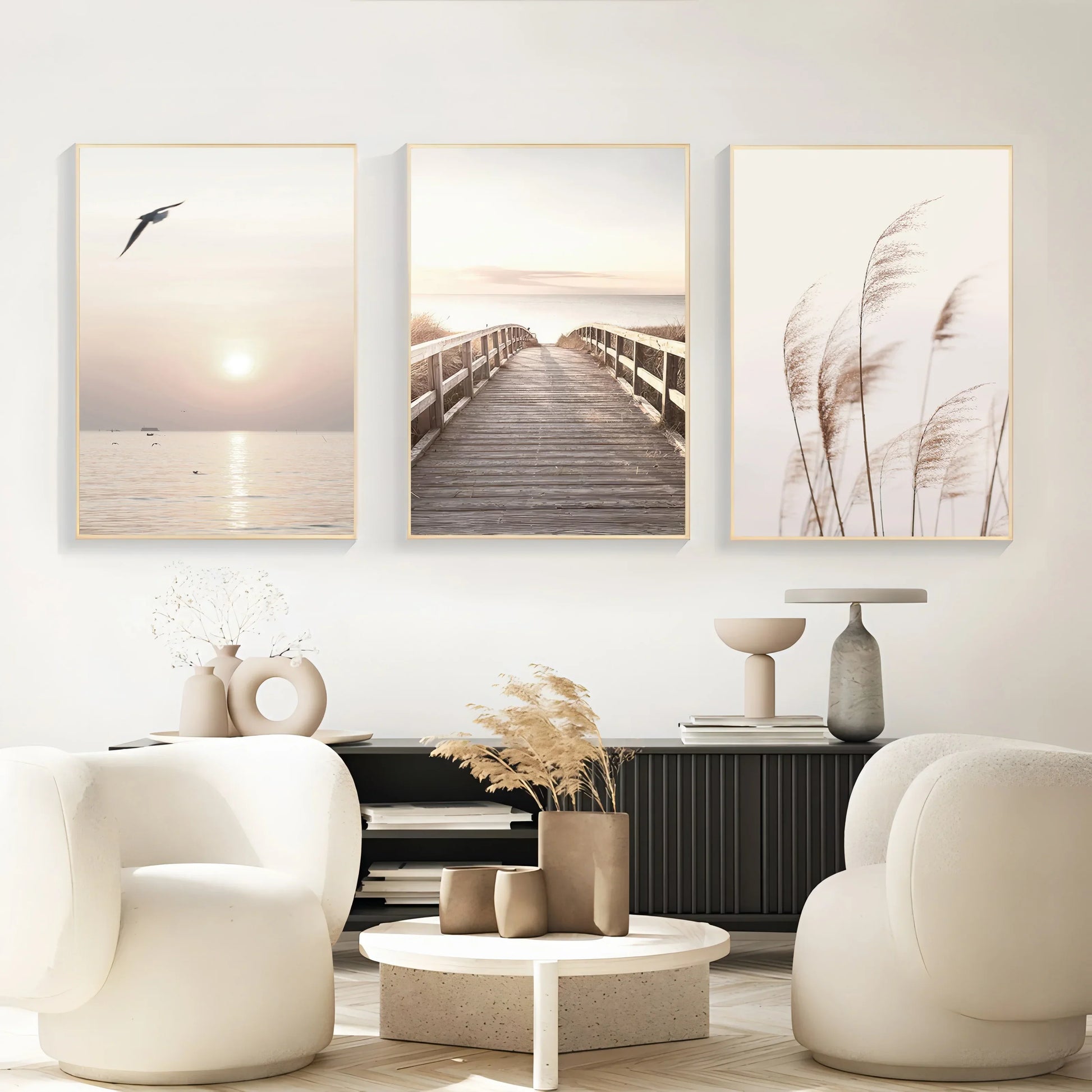 Three framed minimalist white seascape canvas art pieces with nature-inspired beige and muted tones by DecorBites