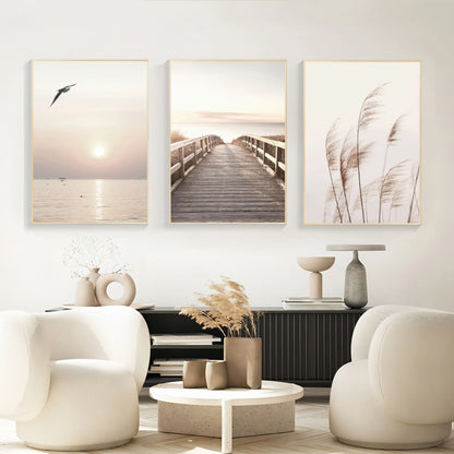 Three framed minimalist white seascape canvas art pieces with nature-inspired beige and muted tones by DecorBites