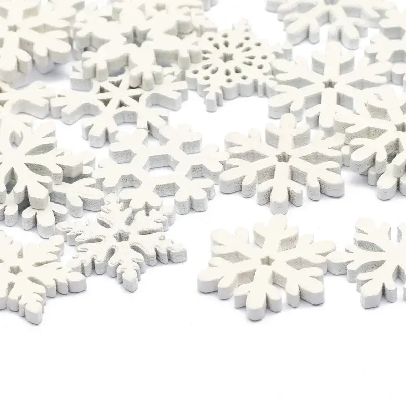 DecorBites white wooden snowflake slices with intricate lattice patterns for christmas crafts and wooden slice decor