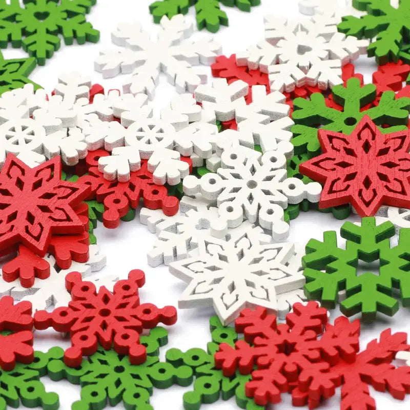 Decorbites™ white wooden snowflake slices with red green and white intricate cut-out designs for christmas crafts