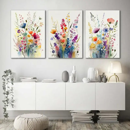 DecorBites wildflowers watercolour posters feature three vibrant canvas wall art pieces with colorful blossoms and stems