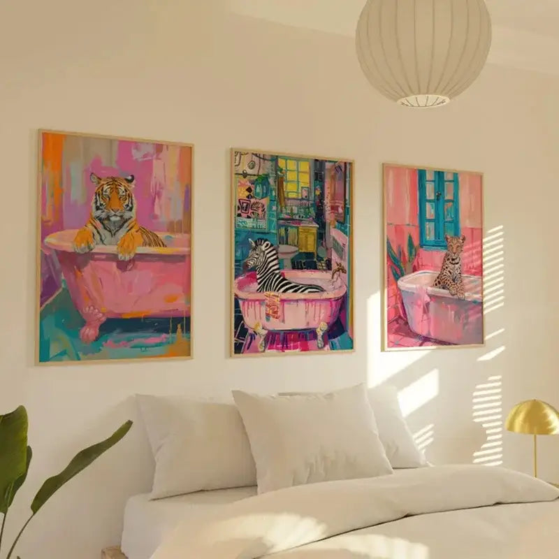 DecorBites™ wildlife bathroom canvas art featuring three vibrant framed canvas paintings of animals in pink bathtubs