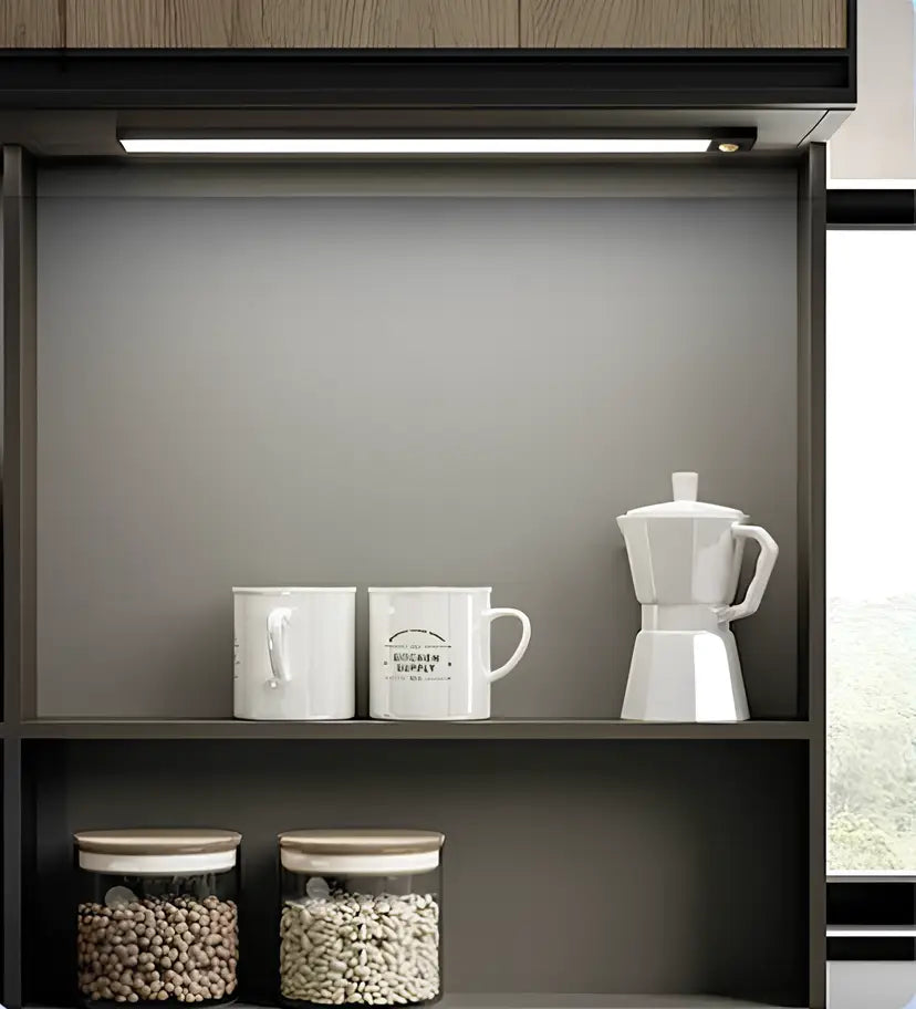 White ceramic moka pot with geometric design and lid featured alongside decorbites wireless under cabinet lighting for kitchen units lighting solution