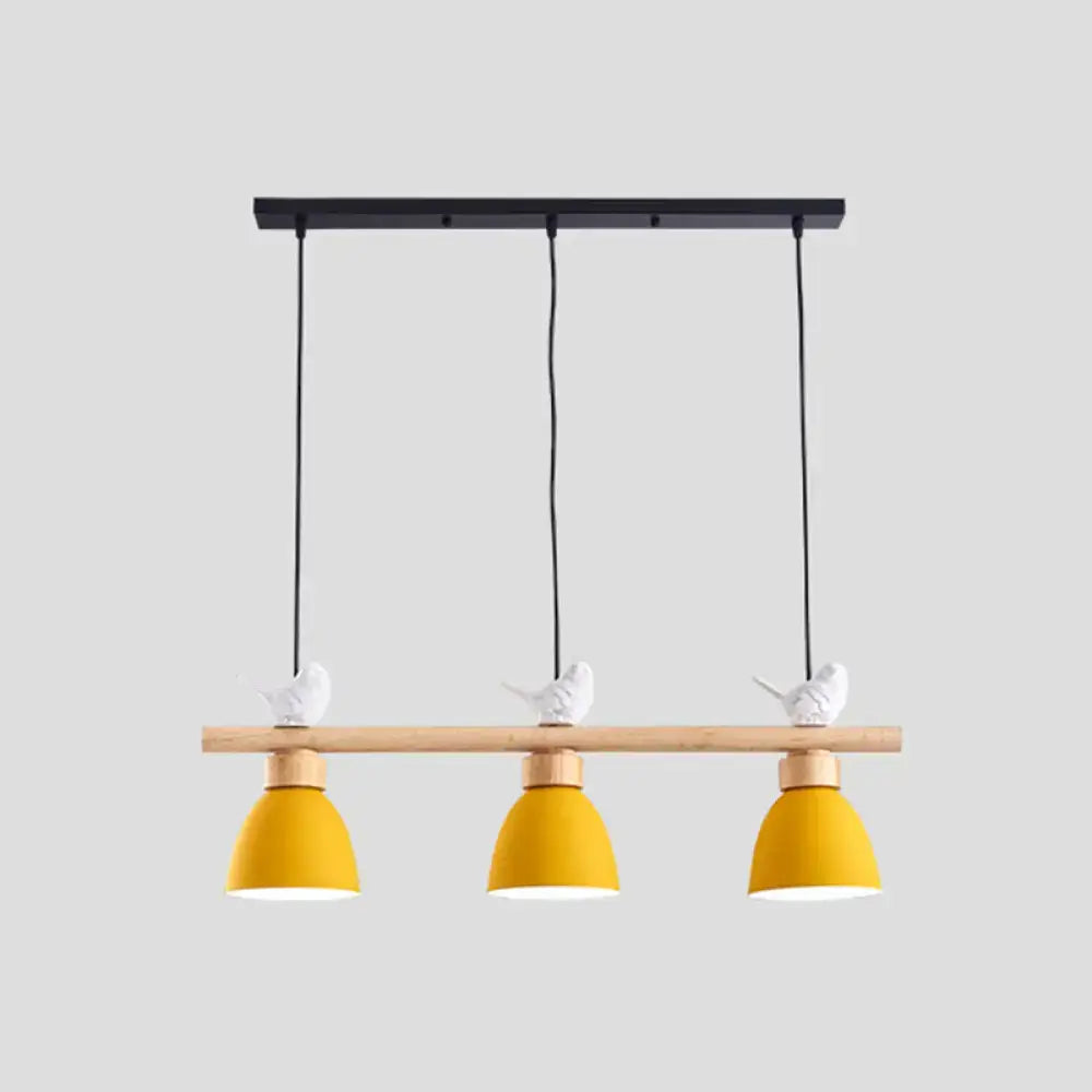 Decorbites wood and metal macaron bowl pendant light with yellow bell shades and white bird figurines mounted on dark blue-gray ceiling with e26 e27 sockets