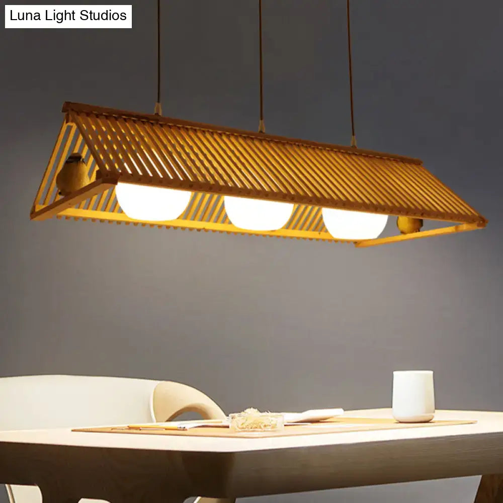 Decorbites wooden asian triangle island pendant light in natural wood finish with woven bamboo and three glowing bulbs