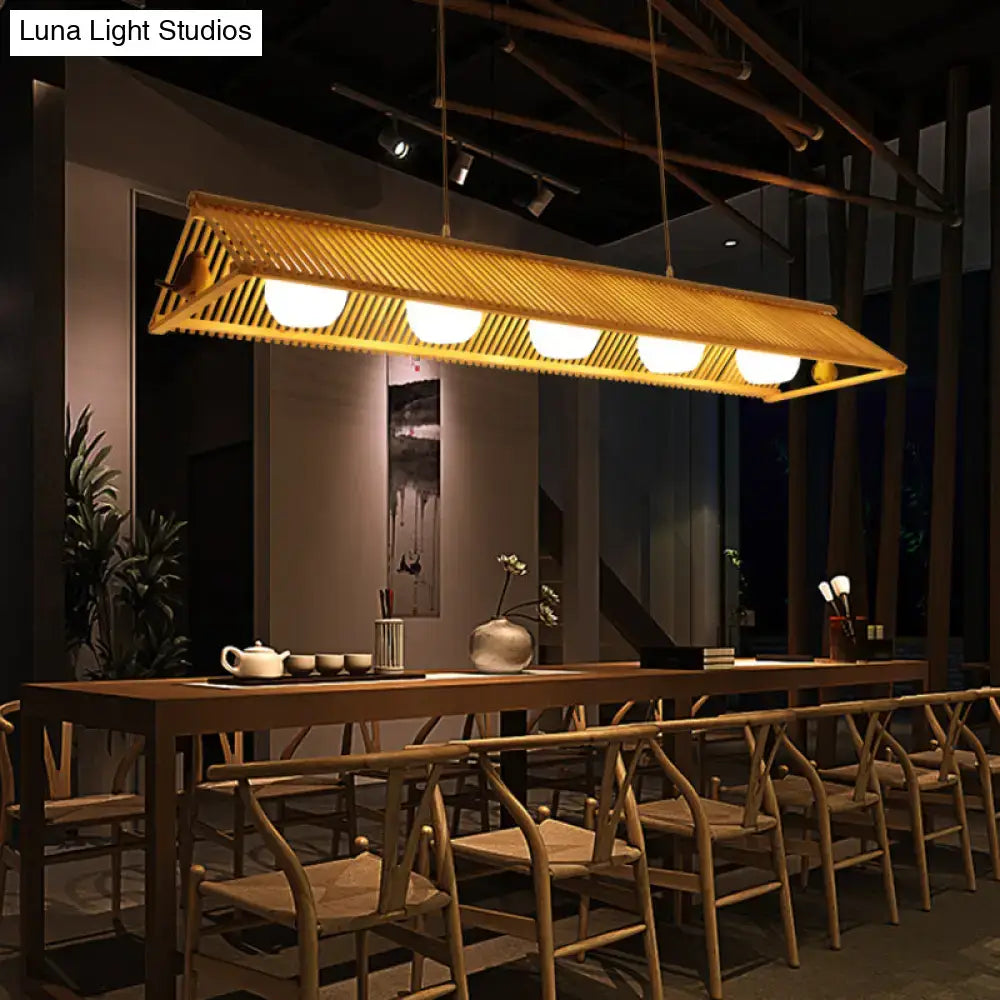 DecorBites wooden Asian triangle island pendant light in natural wood finish with woven bamboo design and four bulbs maximum wattage