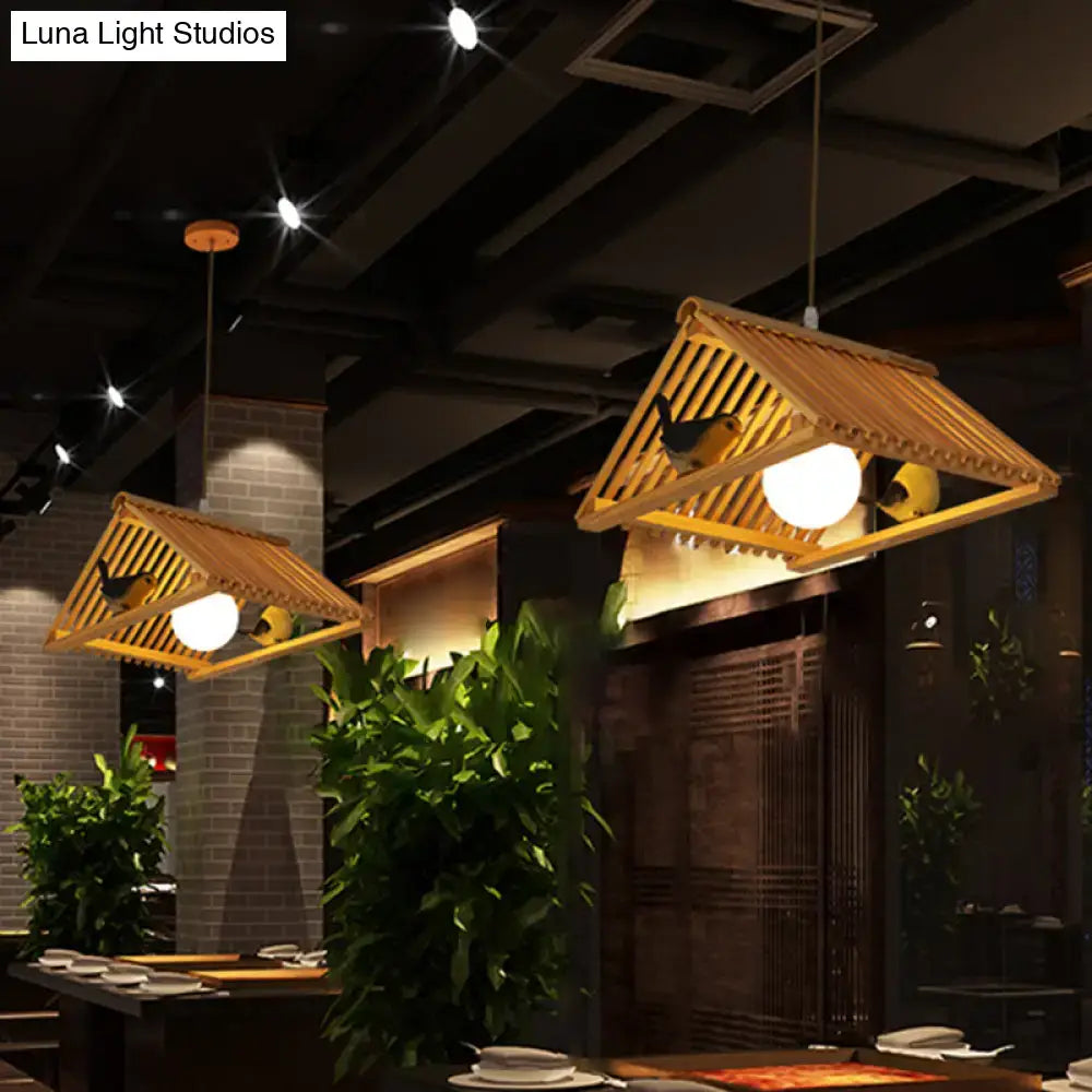 DecorBites™ wooden Asian triangle island pendant light in natural wood finish with warm glow and decorative bird figures