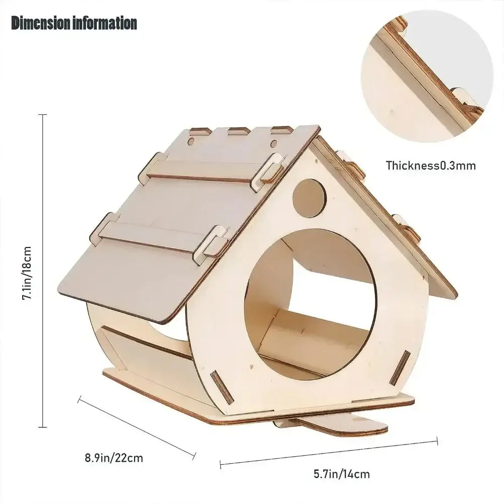 A light-colored wooden bird feeder with a slanted roof and circular entrance for small birds by decorbites