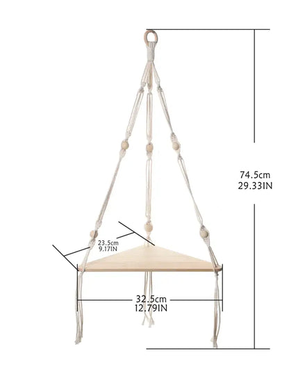 Decorbites™ wooden corner shelf with macrame features a light wood triangular platform and cream woven cords in boho style
