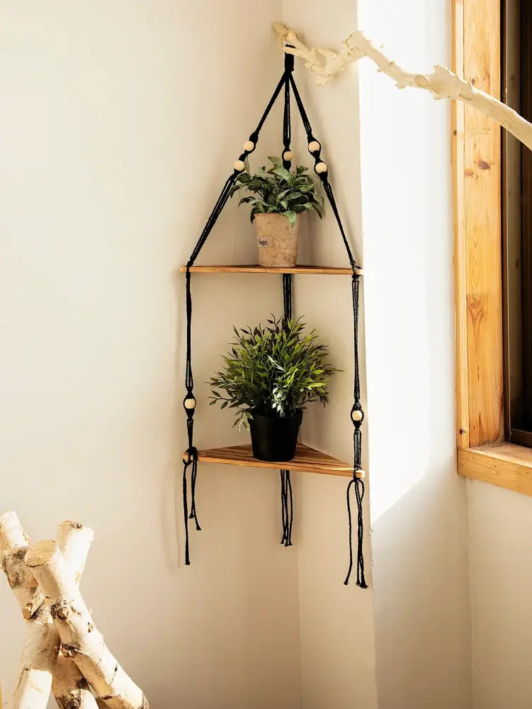 Black macrame wooden corner shelf with wooden tiers and natural wood beads for boho wall decor by decorbites