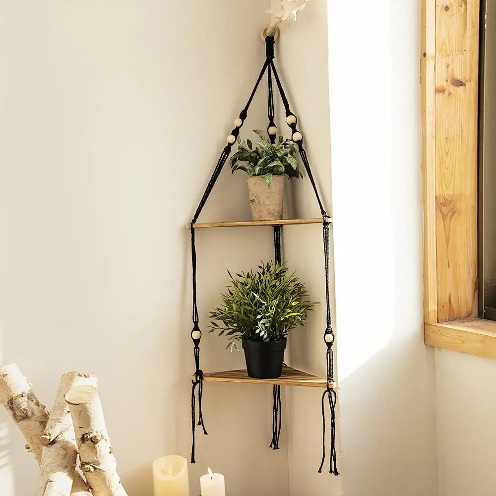 Black macrame wooden corner shelf with wooden slats and white beads for boho wall decor by decorbites